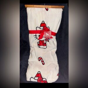 First offer gets it. Hello Kitty Christmas candy cane blanket.